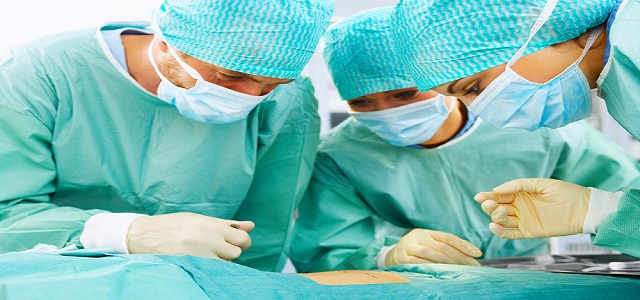 Surgical Team Looking Down Image
